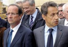 Hollande critique la tribune de Sarkozy au Figaro. 