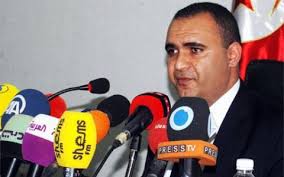 Mohamed Ali Aroui lors d'une conférence de presse. 