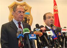 Hamdi et Lavrov lors d'une conférence de presse en mars 2014 à Tunis. 