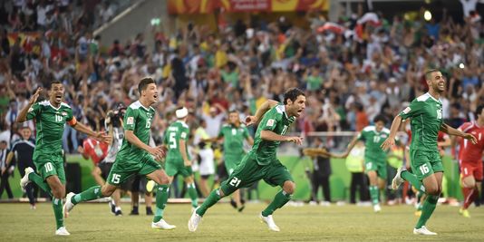 Les joueurs de l'Irak, fous de joie après leur qualification en demi-finale de la Coupe d'Asie